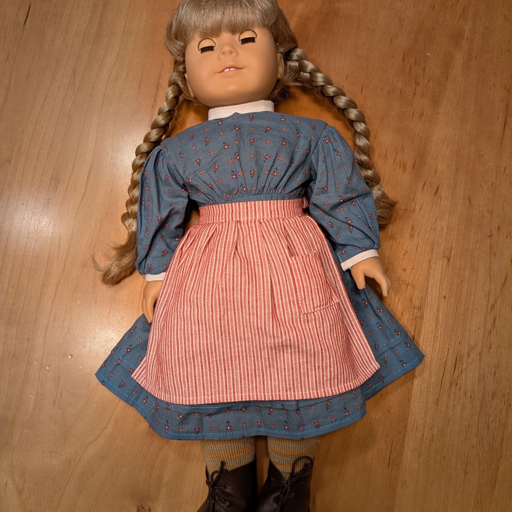 Classic Doll with Blue Dress and Red Apron